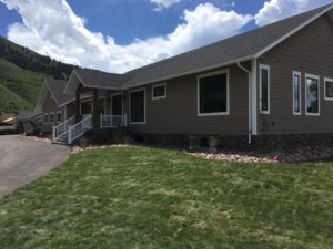 A house with a sod lawn.