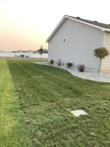 A house with a new sod lawn.